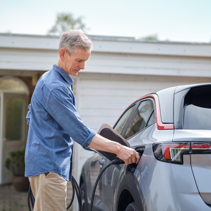 Man Charging Ev